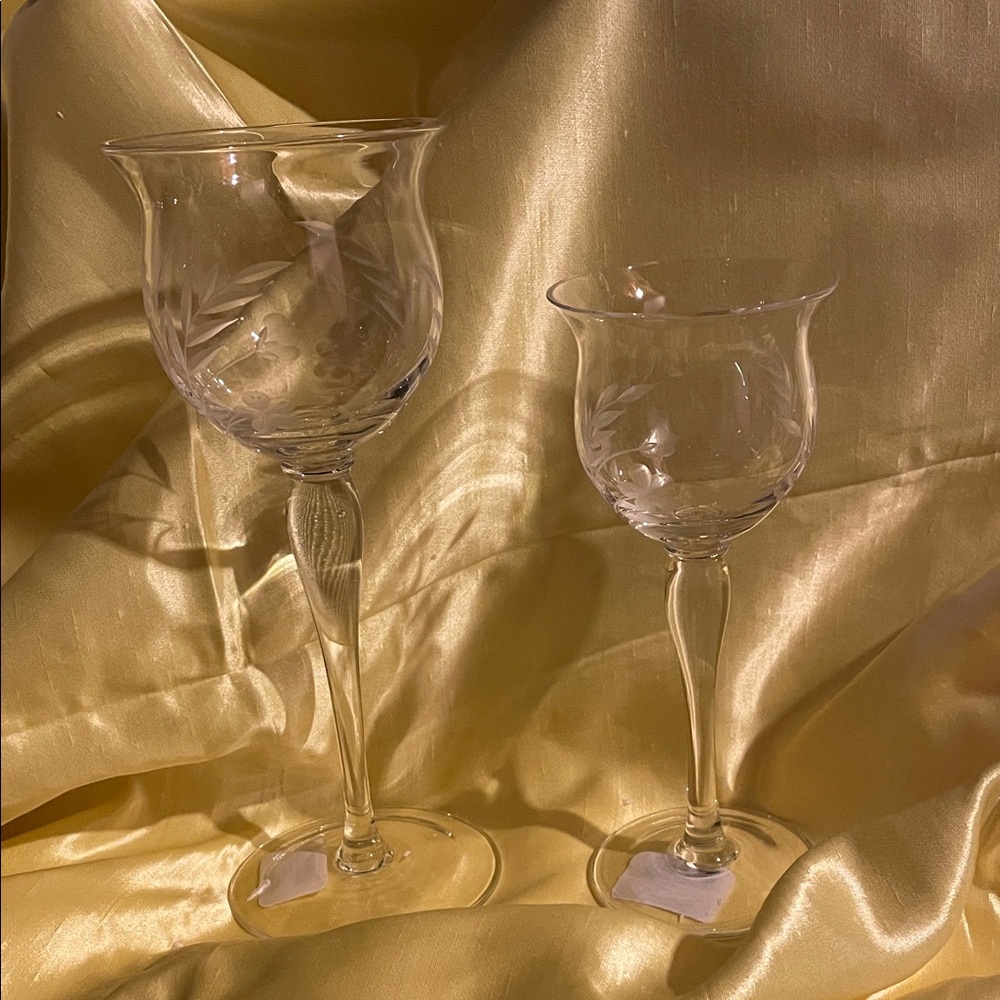 Floral splendor, set of two Lenox crystal daisy candlestick votives.